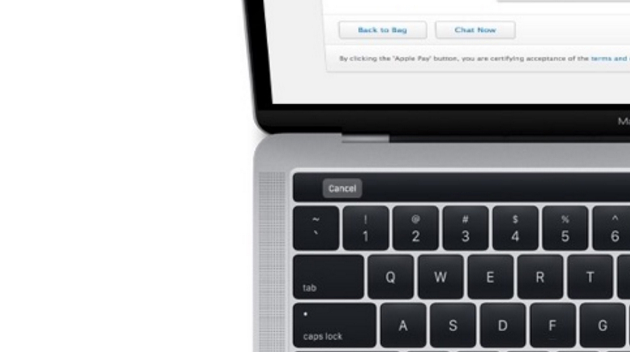 Это новый Mac Book Pro оснащенный сенсорной панелью OLED и сканером отпечатков пальцев Touch ID