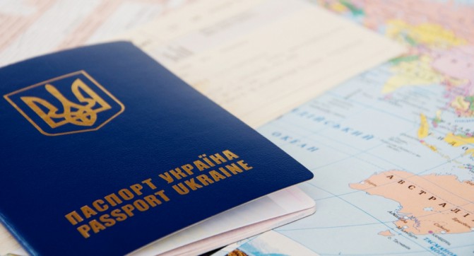 Passport and  Tickets on a World Map