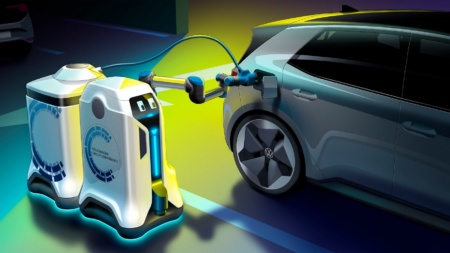 Volkswagen представил концепт автономного робота, который самостоятельно заряжает электромобили на парковке с помощью мобильных батарей [видео]