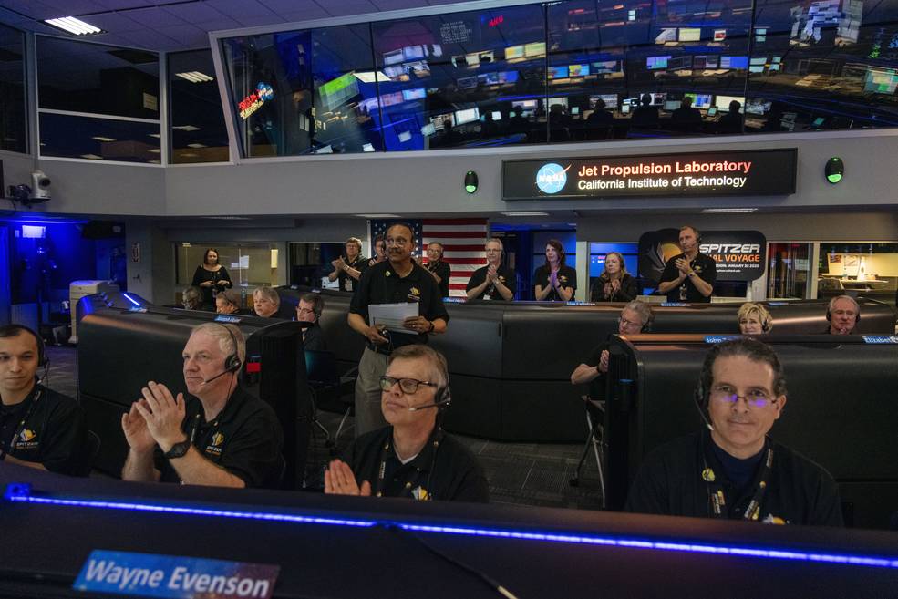 The team at NASA's Jet Propulsion Laboratory's Flight Control Center applauds during the announcement of the end of the Spitzer mission, Jan. 30, 2020.  Photo: NASA/JPL-Caltech