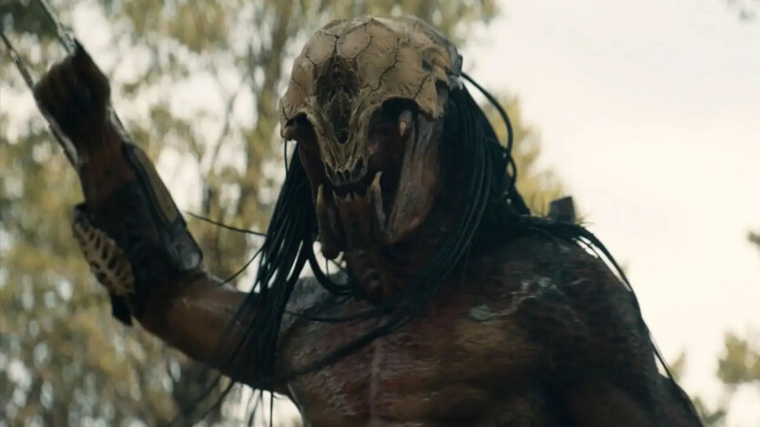 Poster «Predator: Badlands» shows the alien’s armor and an injured Elle Fanning